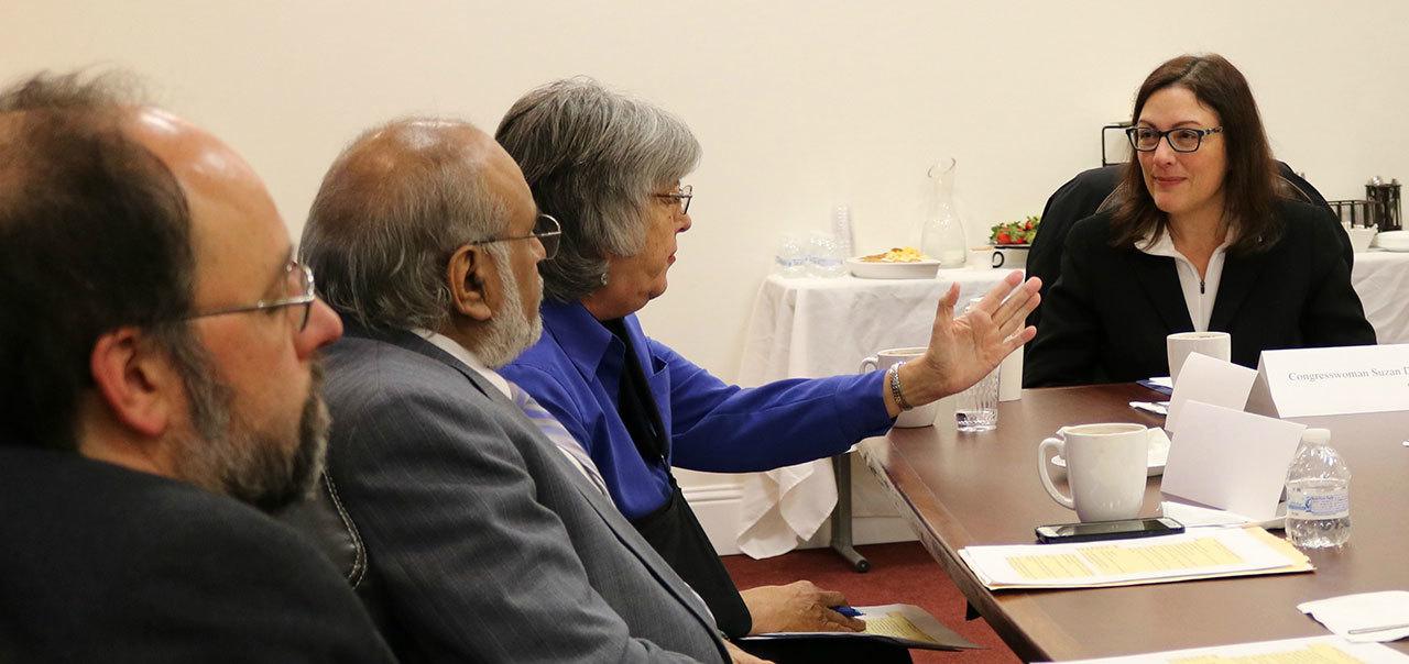 Congresswoman Suzan DelBene, right, meets with religious leaders, including (from left) Michael Ramos, Harjinder Singh and Rev. Carol Jensen on Tuesday at the Muslim Association of Puget Sound in Redmond. Andy Nystrom, Redmond Reporter
