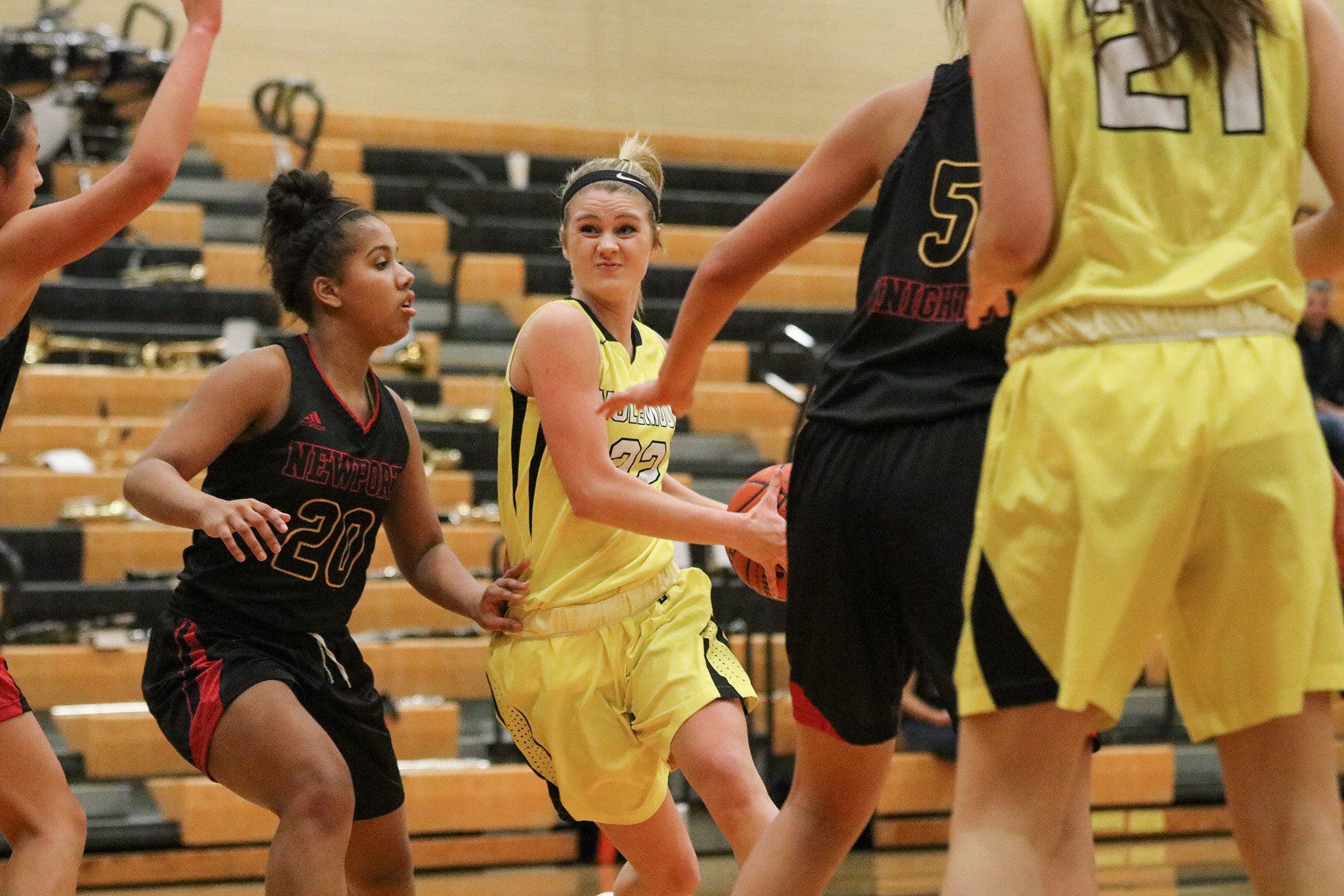 Inglemoor’s Emily Massad drives against Newport’s Jahdai Alcombrack in the second half of Wednesday’s KingCo conference game at Inglemoor High School in Kenmore. JOHN WILLIAM HOWARD/Bothell-Kenmore Reporter