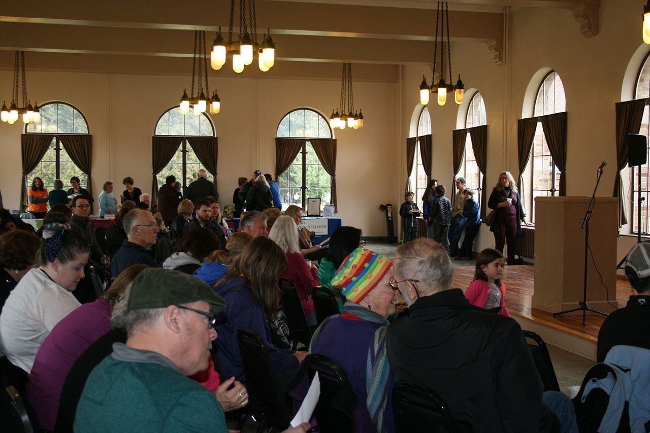 Attendees gather in the St. Edward Seminary dining hall to hear from Daniels Real Estate President Kevin Daniels about the planned changes to the building during an open house on Feb. 11. CATHERINE KRUMMEY/Kenmore Reporter