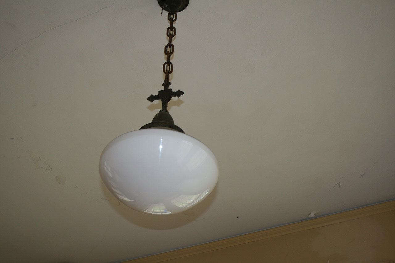 A light fixture is seen in the St. Edward Seminary during a tour of the property on Feb. 11. CATHERINE KRUMMEY / Kenmore Reporter