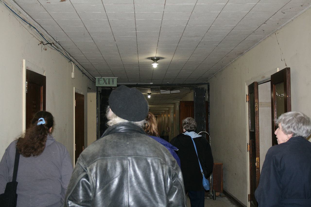 Open house attendees walk through a hallway during a tour of the St. Edward Seminary on Feb. 11. CATHERINE KRUMMEY / Kenmore Reporter