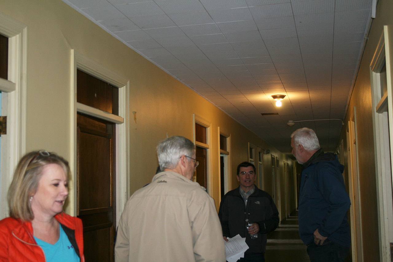 Open house attendees walk through the third-floor hallway during a tour of the St. Edward Seminary on Feb. 11. CATHERINE KRUMMEY / Kenmore Reporter