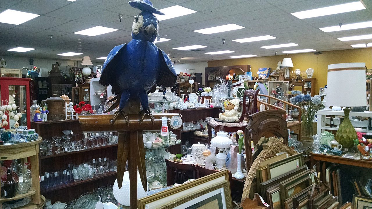 A parrot statue is seen among the merchandise at Not Just Antiques. CATHERINE KRUMMEY / Bothell Reporter