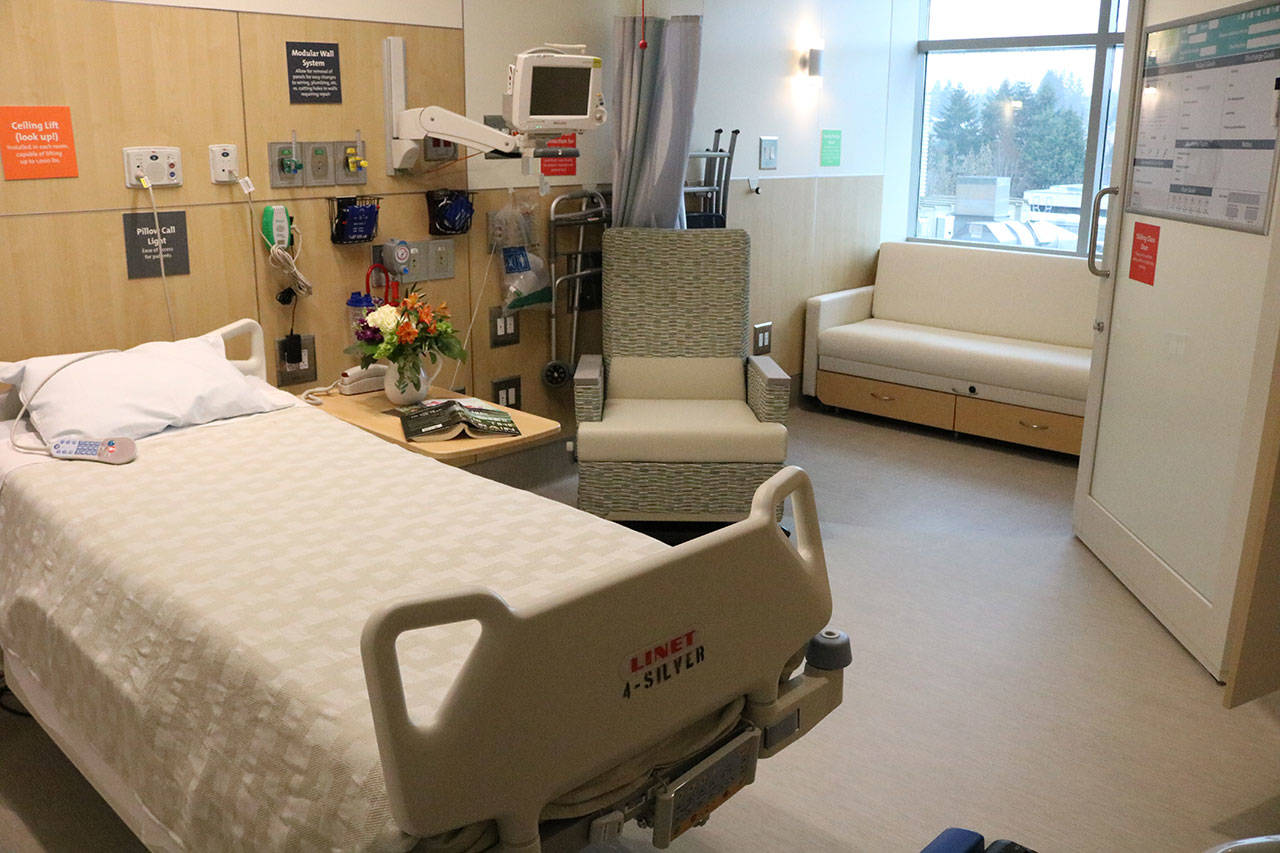 Patient rooms in EvergreenHealth’s 4 Silver facility include a private area with a pull-out bed which can be sectioned off with a curtain. JOHN WILLIAM HOWARD/Kirkland Reporter