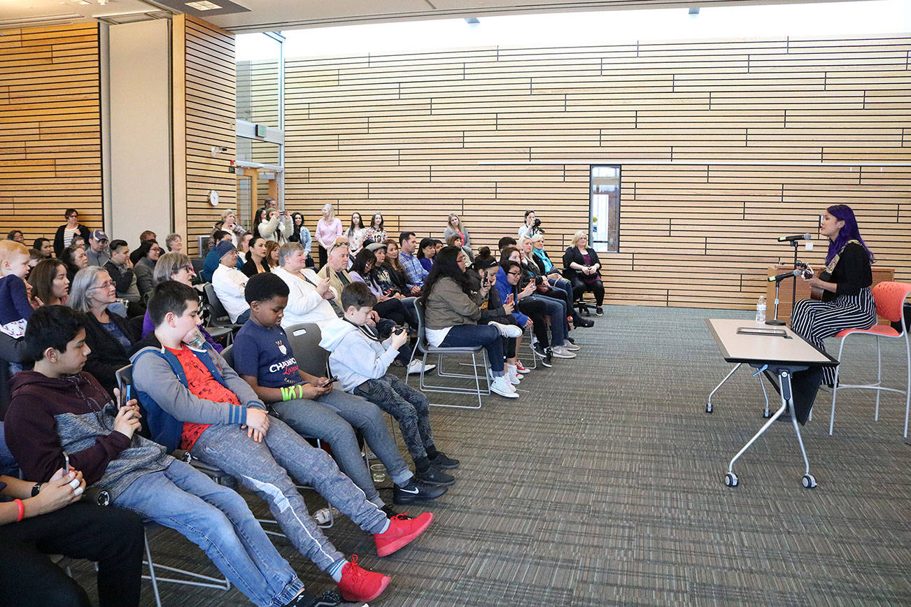 Gaby Borromeo performs to a standing-room only crowd at Kenmore City Hall. CATHERINE KRUMMEY / Kenmore Reporter