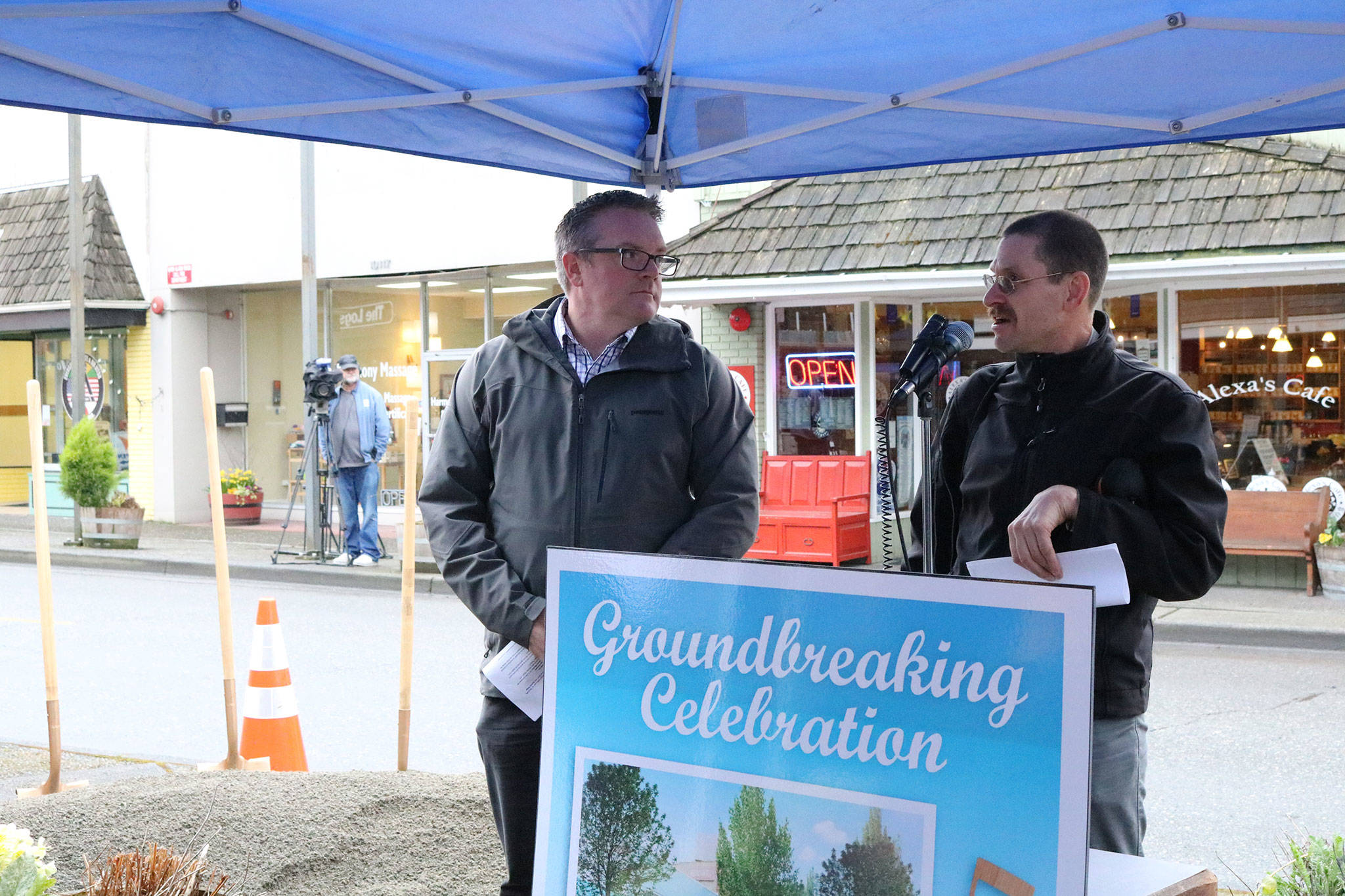 Bothell Mayor Andy Rheaume looks on as Transportation Improvement Board Engineer Greg Armstrong speaks during the groundbreaking ceremony for the Main Street Enhancement Project on March 28. CATHERINE KRUMMEY / Bothell Reporter
