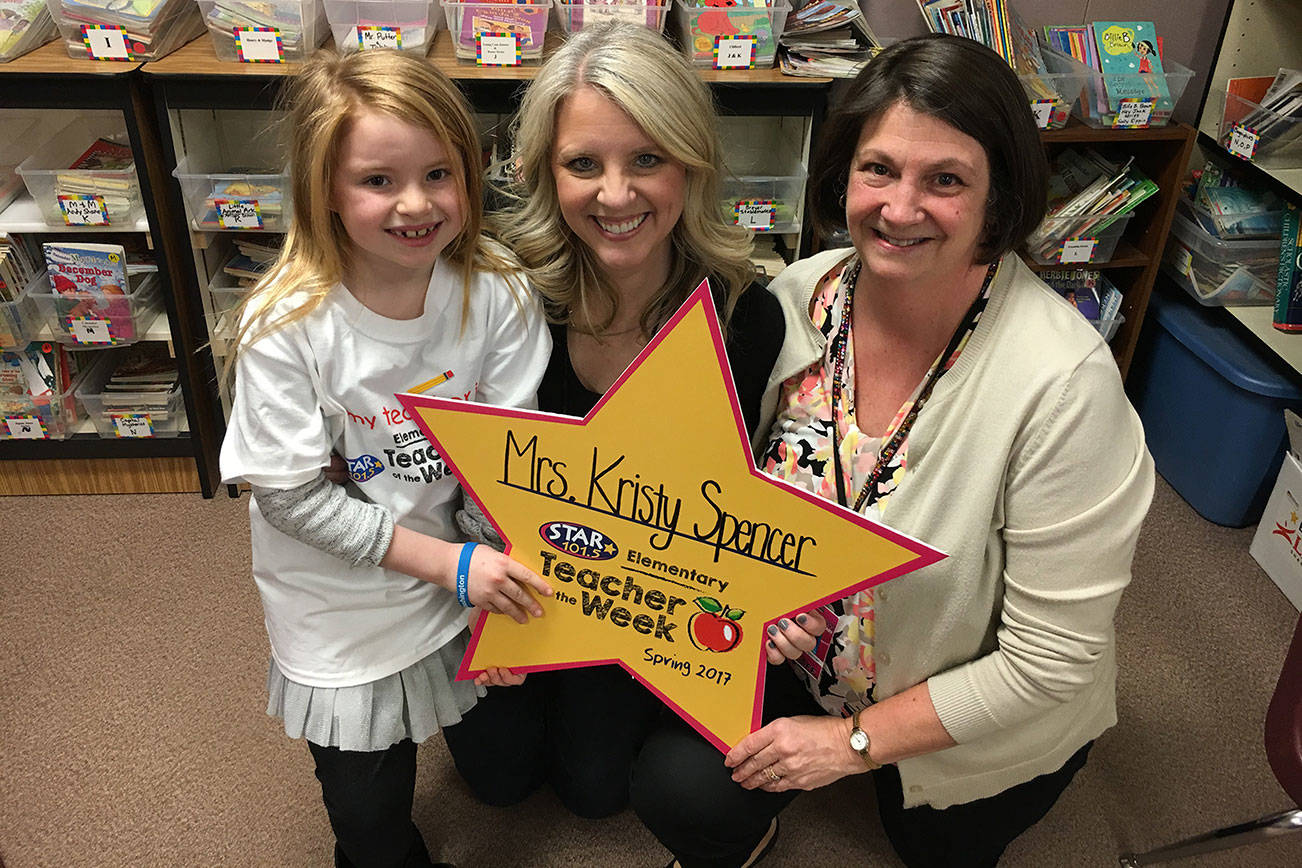 Fernwood Elementary teacher Kristy Spencer, right, was named the STAR 101.5 Elementary Teacher of the Week on March 23. She is show with the student who nominated her, Roran Seavers, and radio host Jen Pirak. Contributed photo