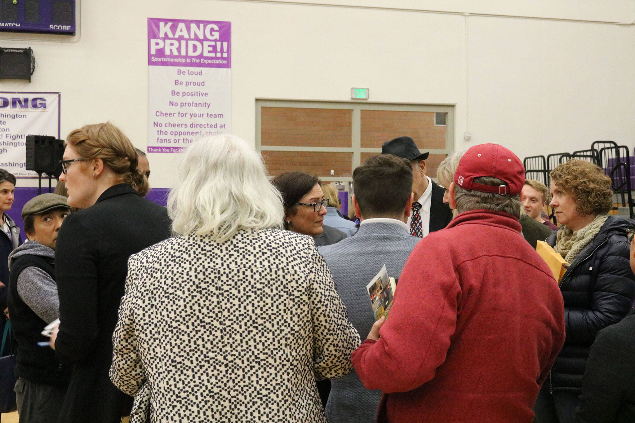 Congresswoman Suzan DelBene (center) speaks with constituents following a town hall event at Lake Washington High School in Kirkland. CATHERINE KRUMMEY/Kirkland Reporter