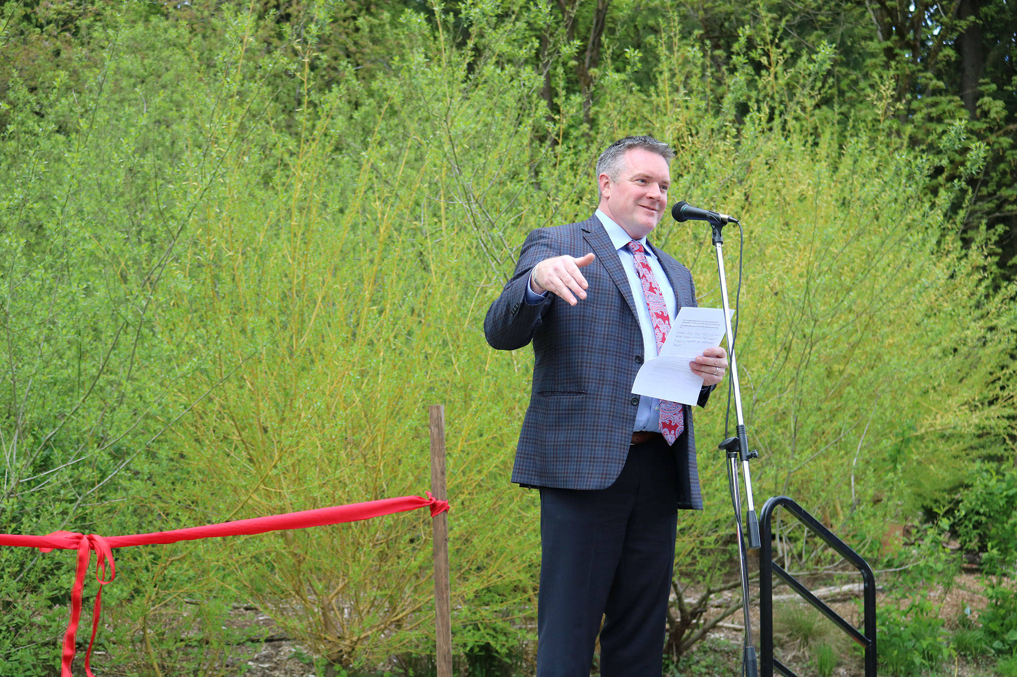 Bothell Mayor Andy Rheaume opens the ribbon-cutting ceremony with some remarks. CATHERINE KRUMMEY / Bothell Reporter