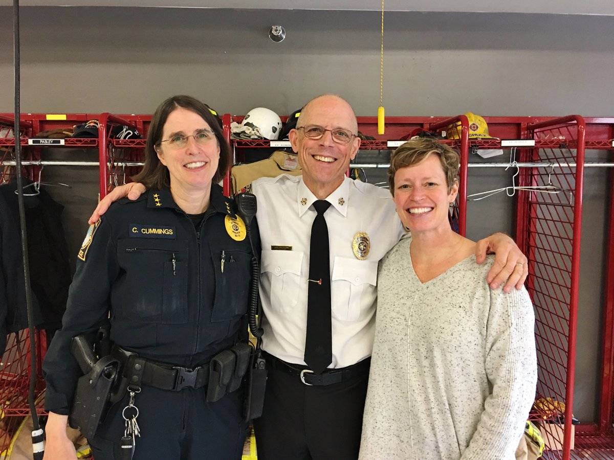 Bothell Fire Chief Bob Van Horne celebrates his last day on the job alongside Bothell Police Chief Carol Cummings and Bothell Public Works Director Erin Leonhart. Courtesy photo