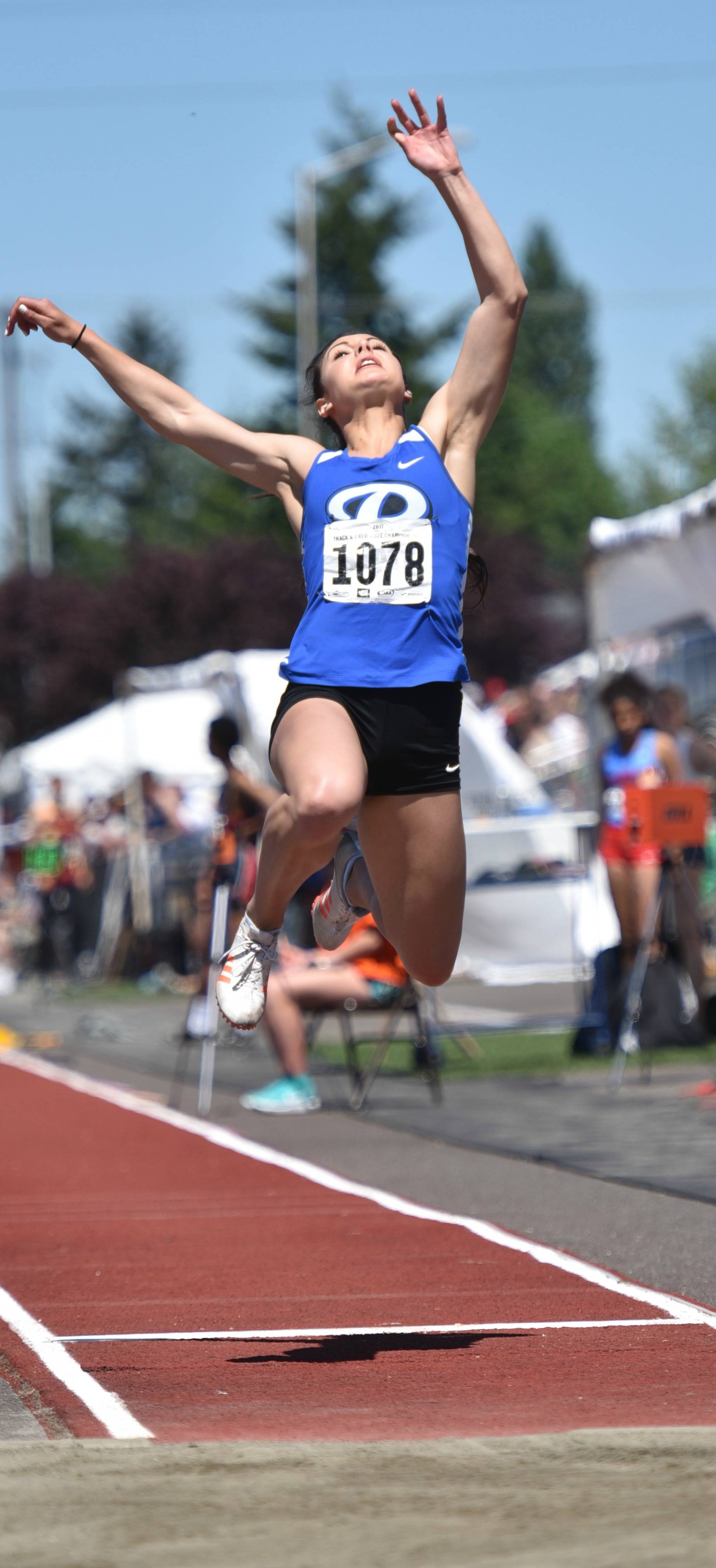 Bothell’s Lauren Stavig competes in the long jump. Courtesy of Greg Nelson