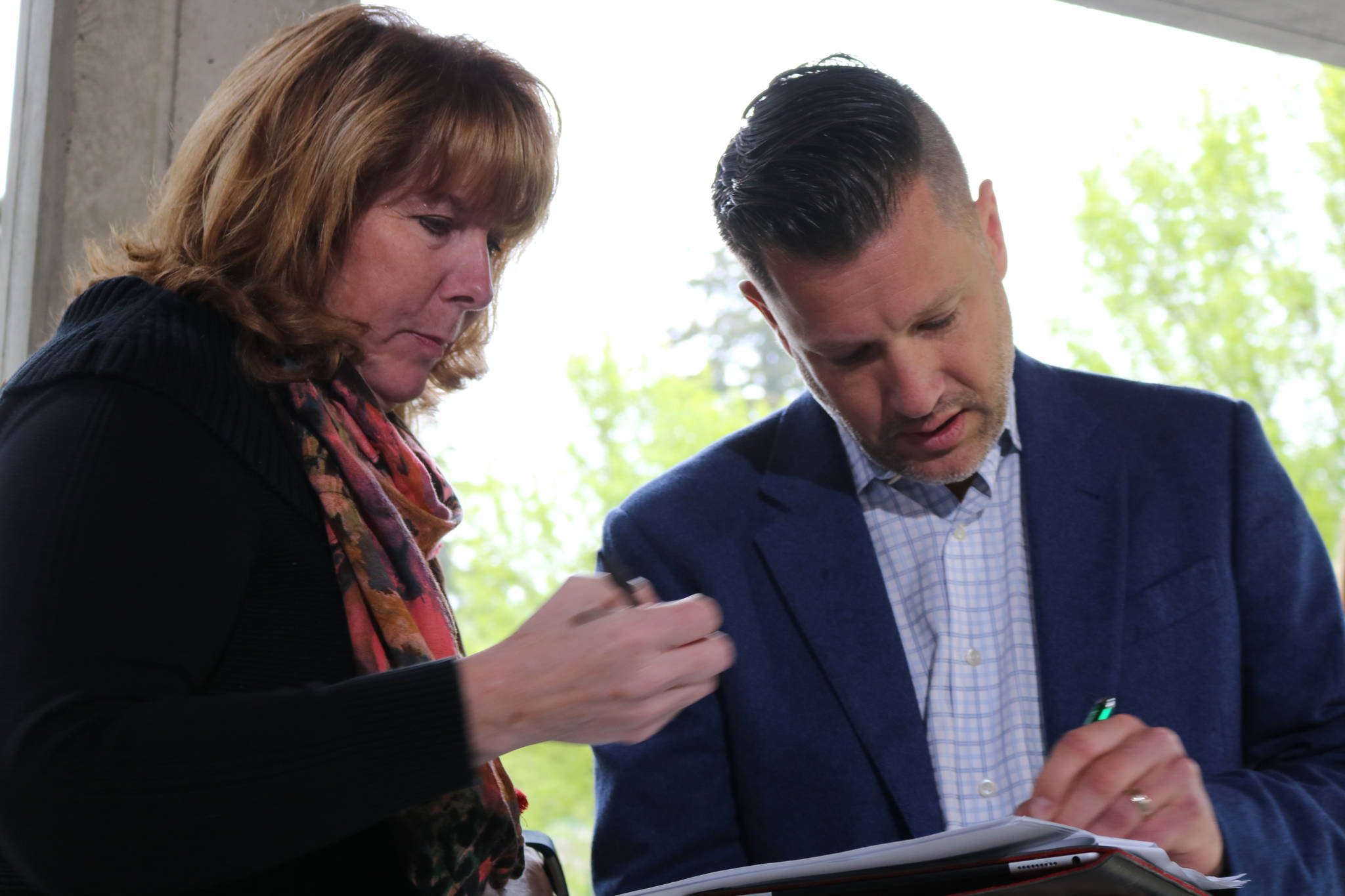 Joshua Freed, right, is the chair of Citizens for a Safe King County. The group has launched a campaign to gather signatures to place an initiative on the November ballot that would prohibit government-funded injection sites in the county. Aaron Kunkler/Redmond Reporter