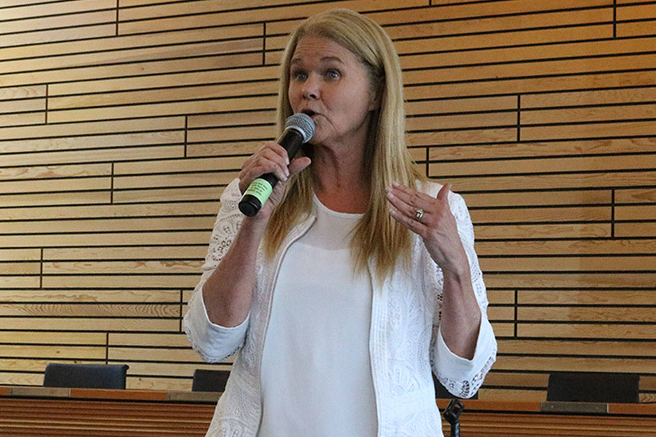 Mary’s Place executive director Marty Hartman speaks at a community meeting about a 24-hour family shelter coming to Kenmore. CATHERINE KRUMMEY, Bothell-Kenmore Reporter