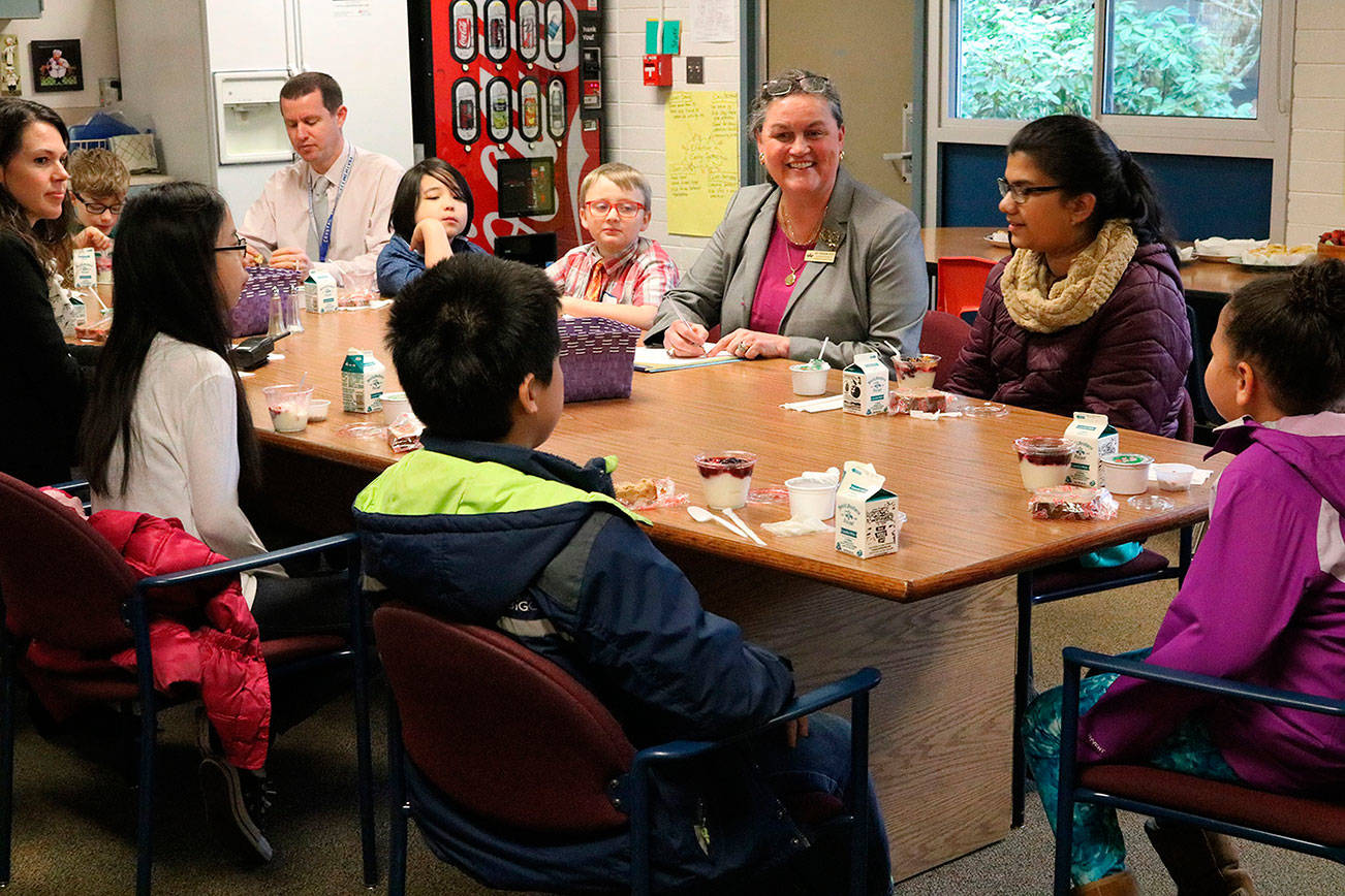 Northshore School District Superintendent Dr. Michelle Reid (center) visits with students and administrators at Crystal Springs Elementary School in Bothell. CATHERINE KRUMMEY, Bothell-Kenmore Reporter