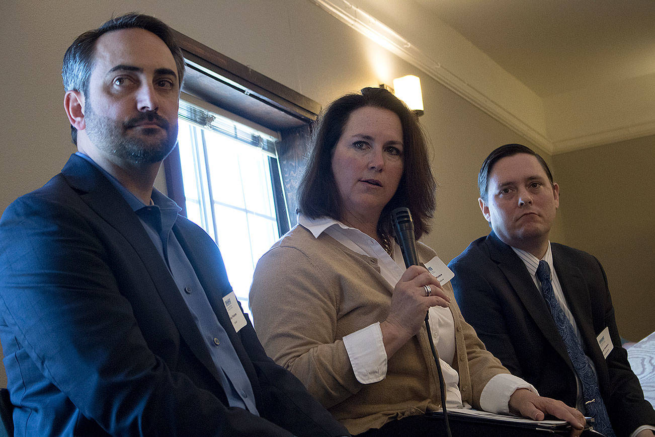 Sen. Guy Palumbo (Left), Rep. Shelley Kloba (Center) and Rep. Derek Stanford (Right) listen to crowd questions during a Greater Bothell Chamber of Commerce luncheon. The legislators talked on budget votes during the event last week.