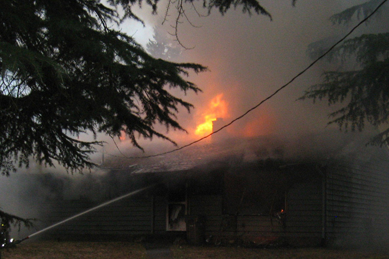 Two injured, a dog died in house fire north of Bothell