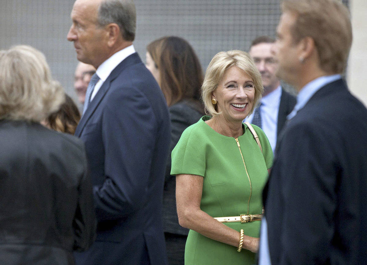 U.S. Education Secretary Betsy DeVos arrives at the dedication ceremony of Michigan State University’s new Grand Rapids Medical Research Center on Wednesday in Grand Rapids, Michigan. (Cory Morse /The Grand Rapids Press via AP)