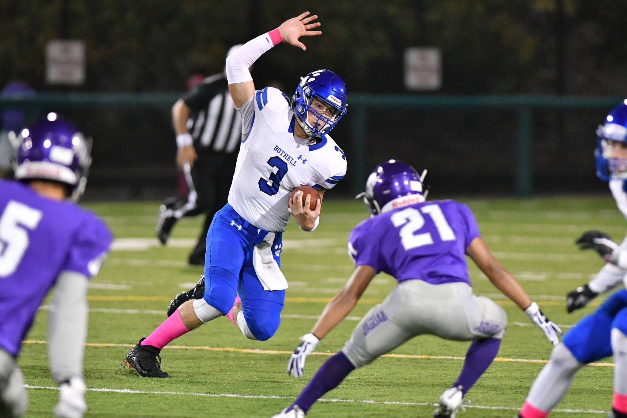 Bothell’s Jacob Sirmon runs through the North Creek defense. Courtesy of Greg Nelson