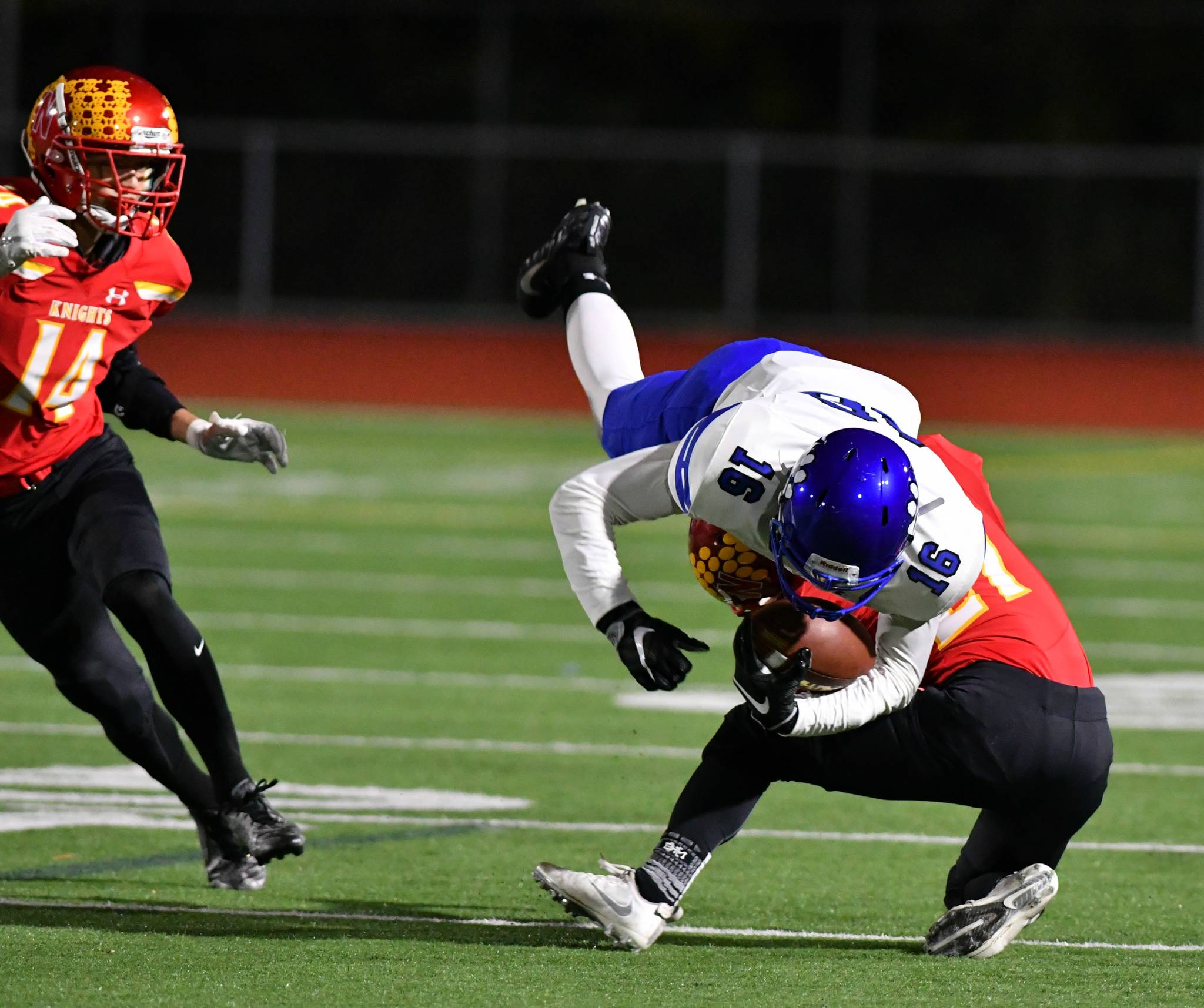 Bothell’s Ryder Locknane collides with a Newport player in Friday night’s game. Courtesy of Greg Nelson