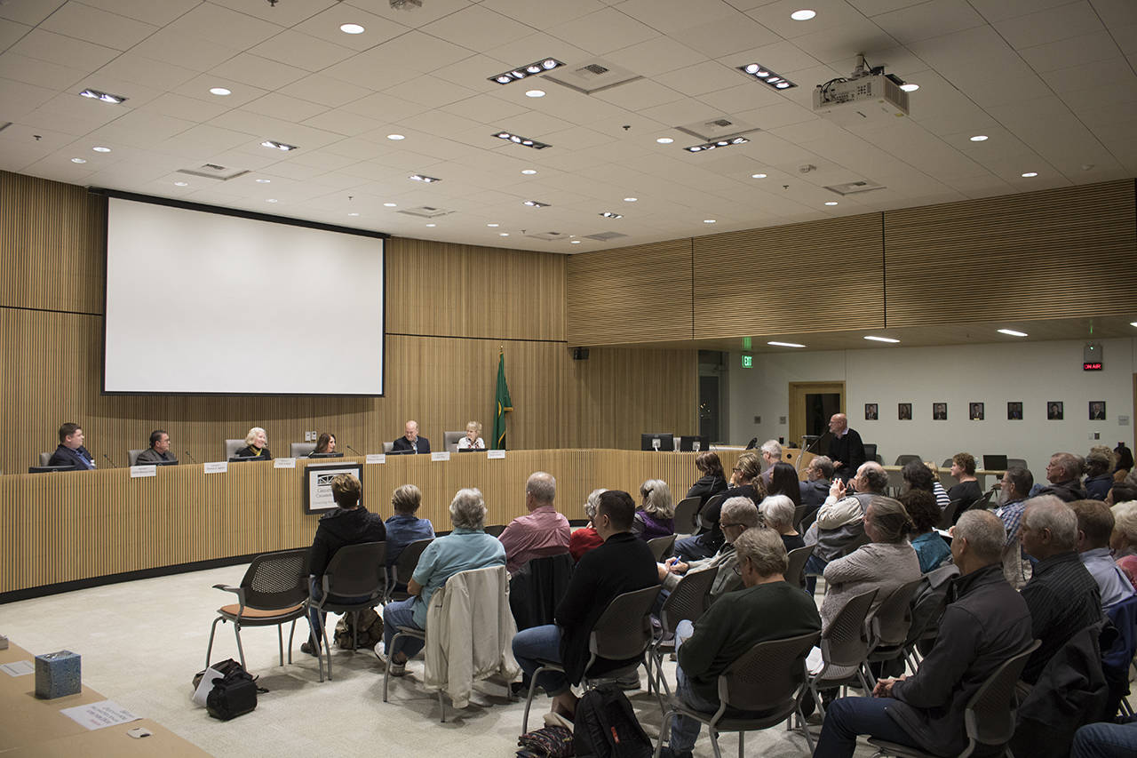 (Left to Right) Bothell City Council candidates Aaron Moreau-Cook, Thomas Agnew, Vicki Somppi, Rosemary McAuliffe, Liam Olsen and Jeanne Zornes answer community questions in the nearly full council chambers. Kailan Manandic, Bothell-Kenmore Reporter