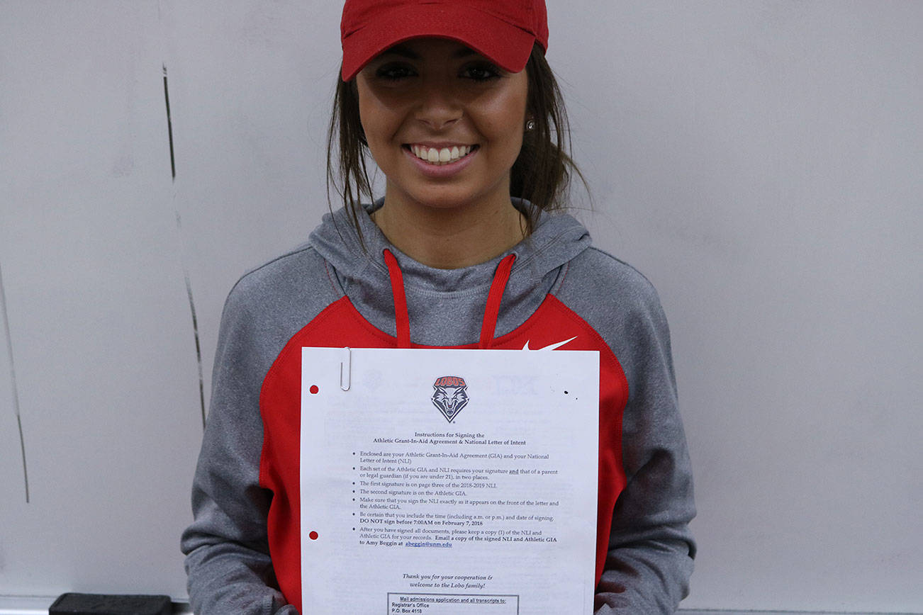 Kylie Russell signs a letter of intent to play for the University of New Mexico’s women’s soccer team next fall. Kailan Manandic, Bothell/Kenmore Reporter