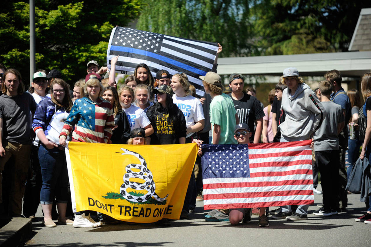 Sequim High school students gathered at the flag pole on campus for 16 minutes on May 2 to participate in a national walkout “Stand for the Second” supporting the Second Amendment and the right to bear arms. (Erin Hawkins/Sequim Gazette)