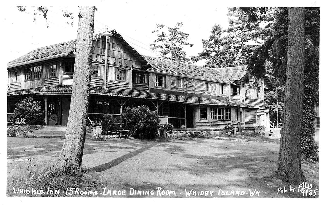 This photo of the historic hotel, originally named the Whid Isle Inn, was featured on a Ellis Post Card Co. post card circa 1945. (Captain Whidbey Inn Collection)