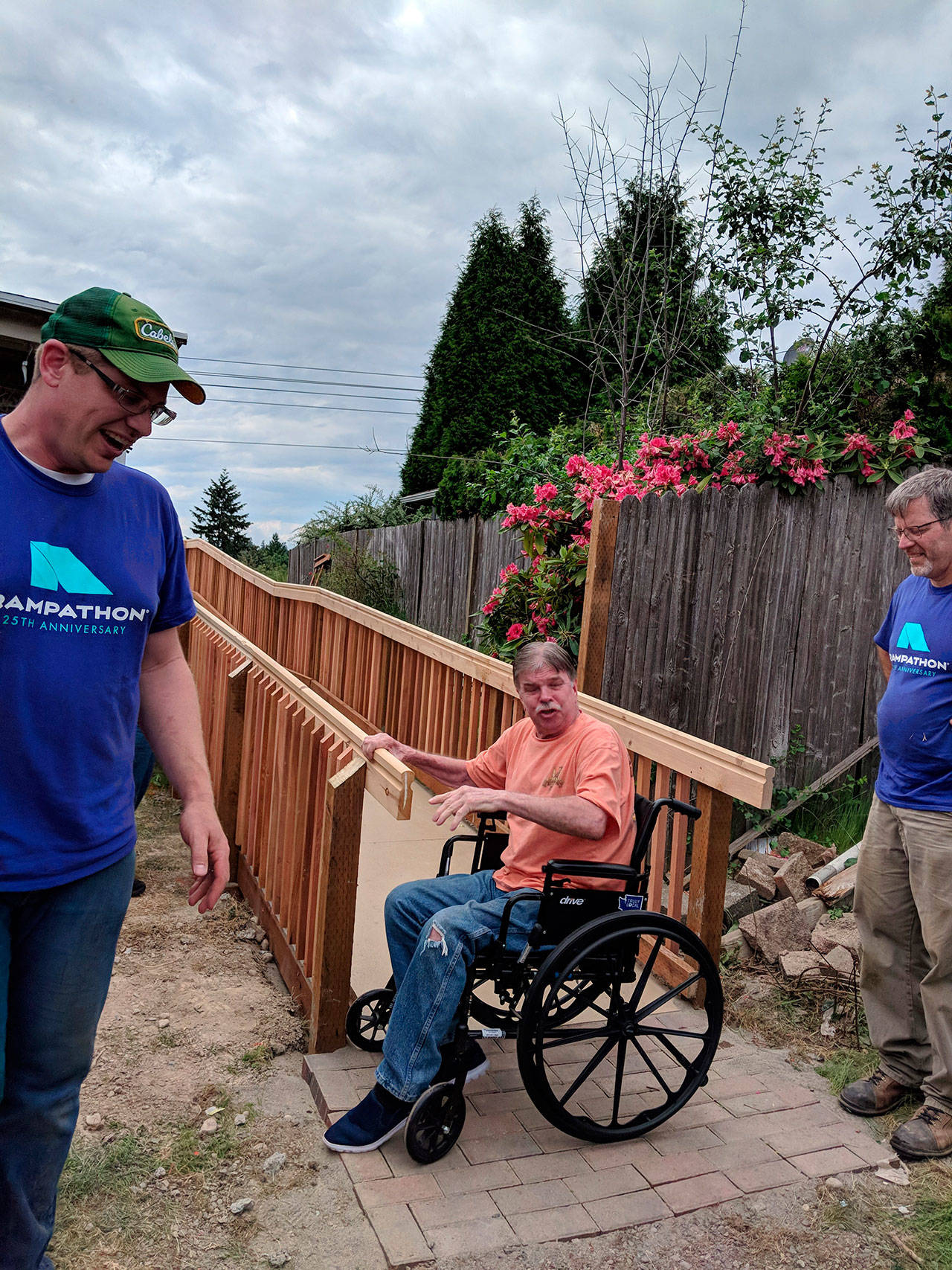 Volunteers build access ramps for locals