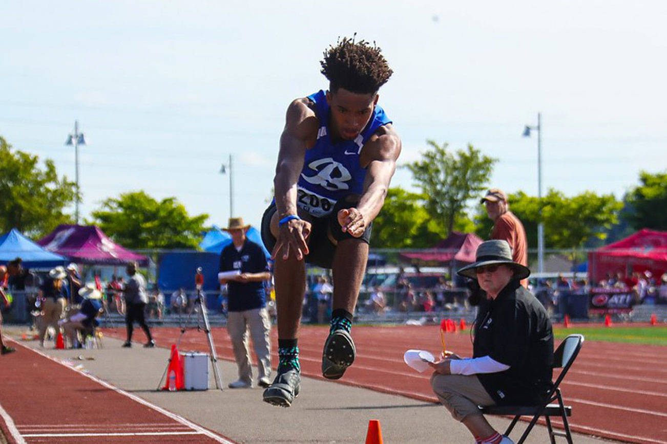 Photo courtesy of Don Borin/Stop Action Photography                                Bothell Cougars senior Da’Vicious Wilson earned first place in the long jump with a leap of 23 feet, 7.75 inches at the Class 4A state track meet on May 24 at Mount Tahoma High School in Tacoma.