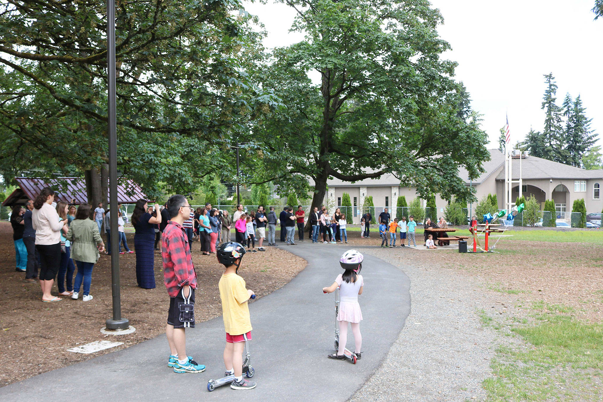 A crowd gathers at the Moorlands Park ribbon cutting on June 23. Photo courtesy of the city of Kenmore