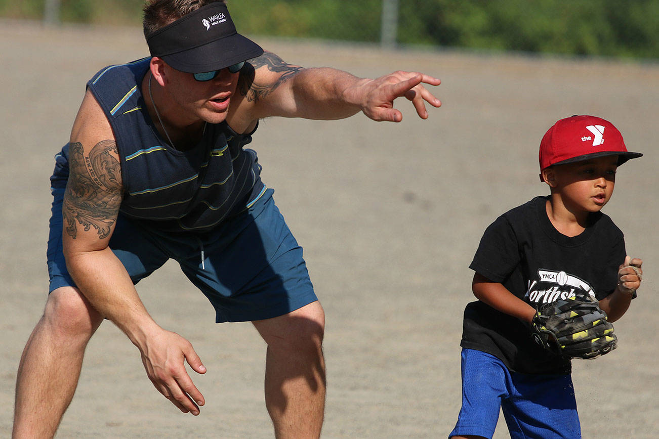 Kids hit the baseball diamond at Northshore YMCA program