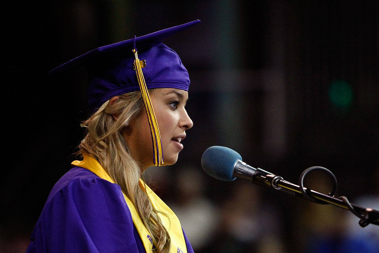 Ivy Jacobsen, now a Bothell police officer, spoke about being a survivor of sexual abuse at her graduation from Lake Stevens High School in 2014. (Photo by Ian Terry / Herald File)