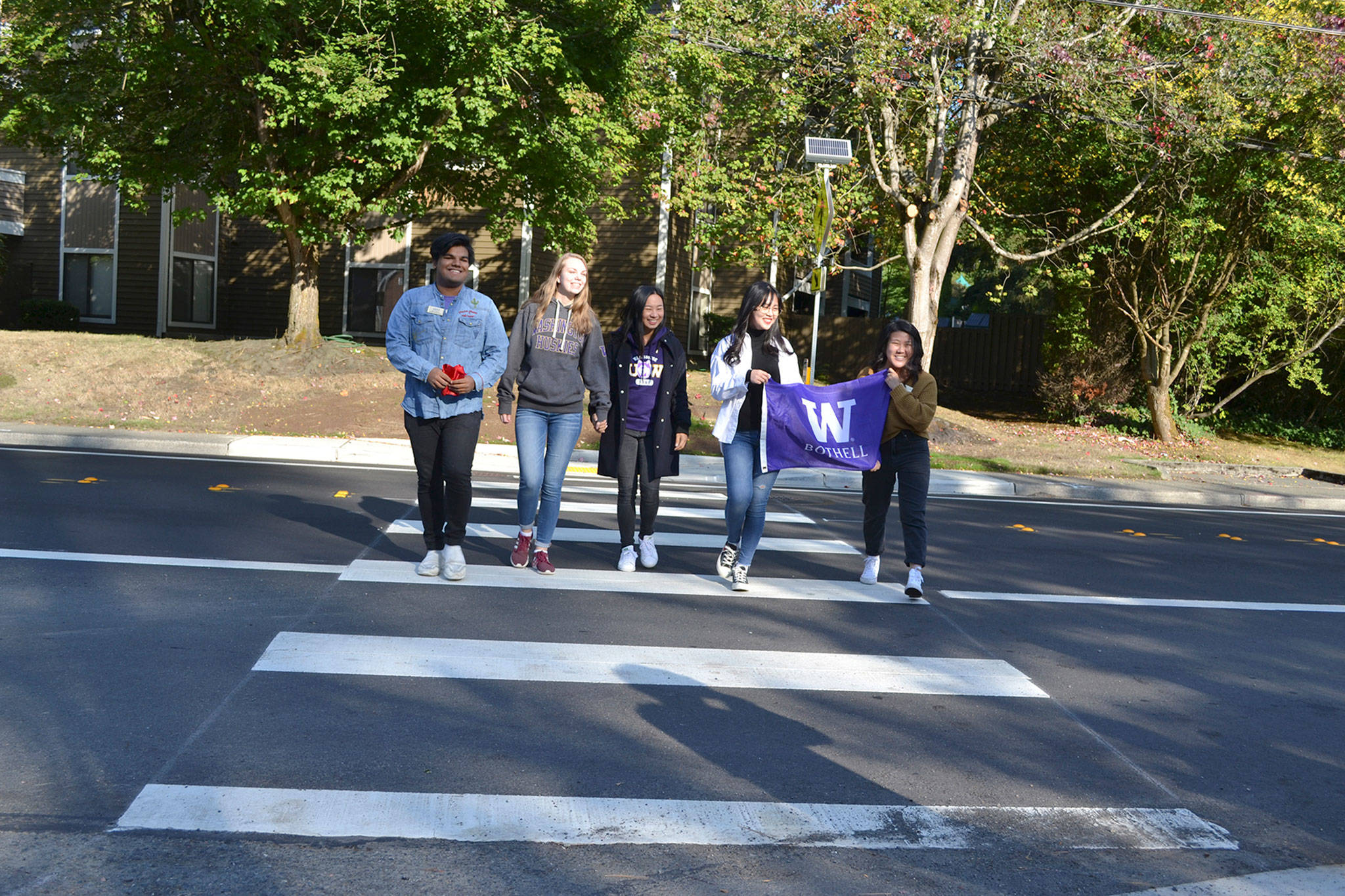UW Bothell students cross a repaved and rebuilt Beardslee Boulevard on Oct. 4. Photo courtesy of the city of Bothell