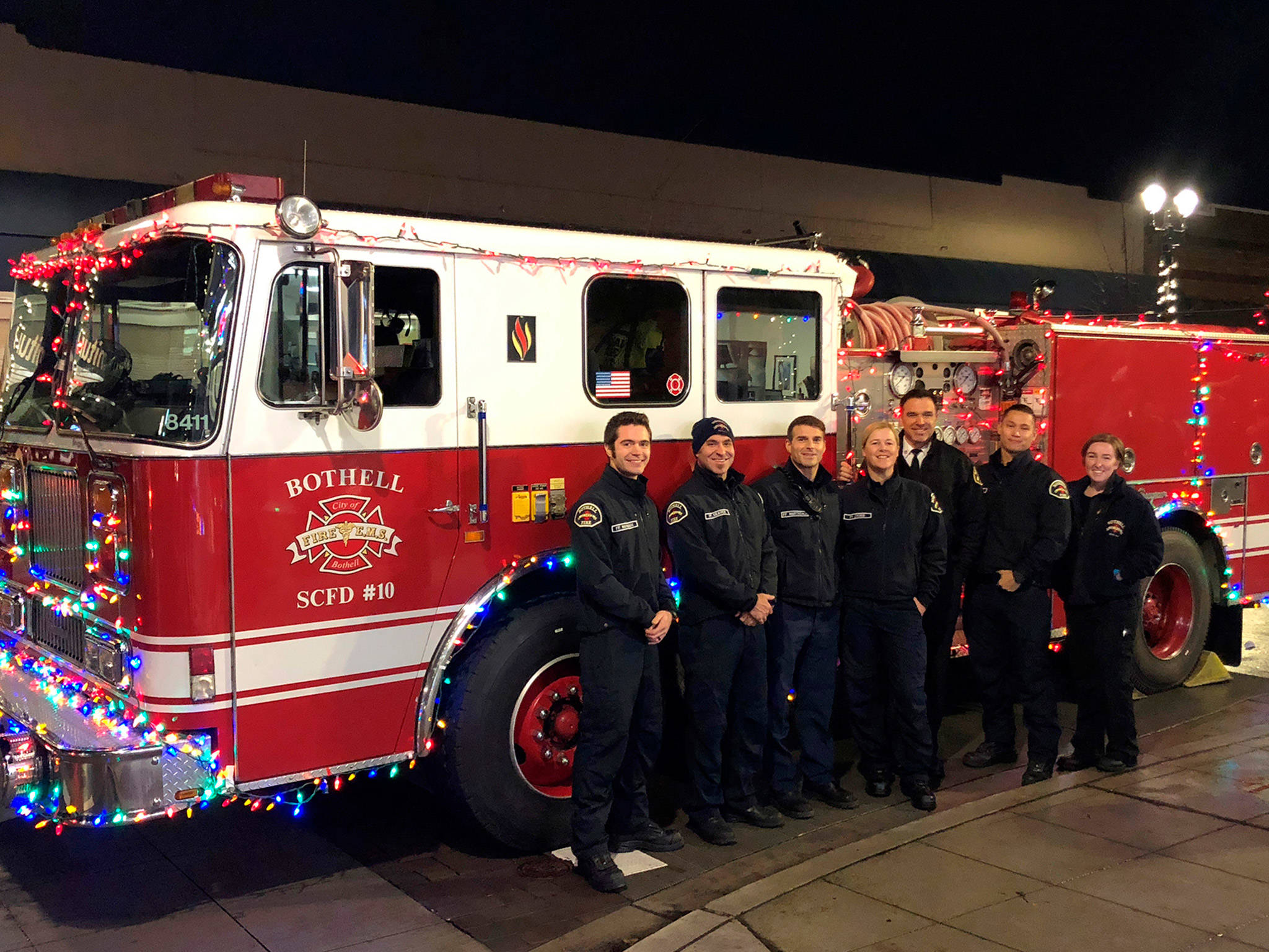 Bothell firefighters pose at the downtown tree lighting event on Dec. 2. Photo courtesy of the city of Bothell