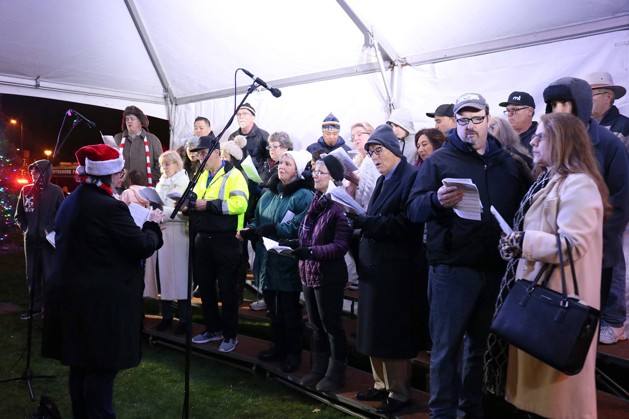 A local choir performs at Kenmore’s tree lighting festival. Katie Metzger/staff photo