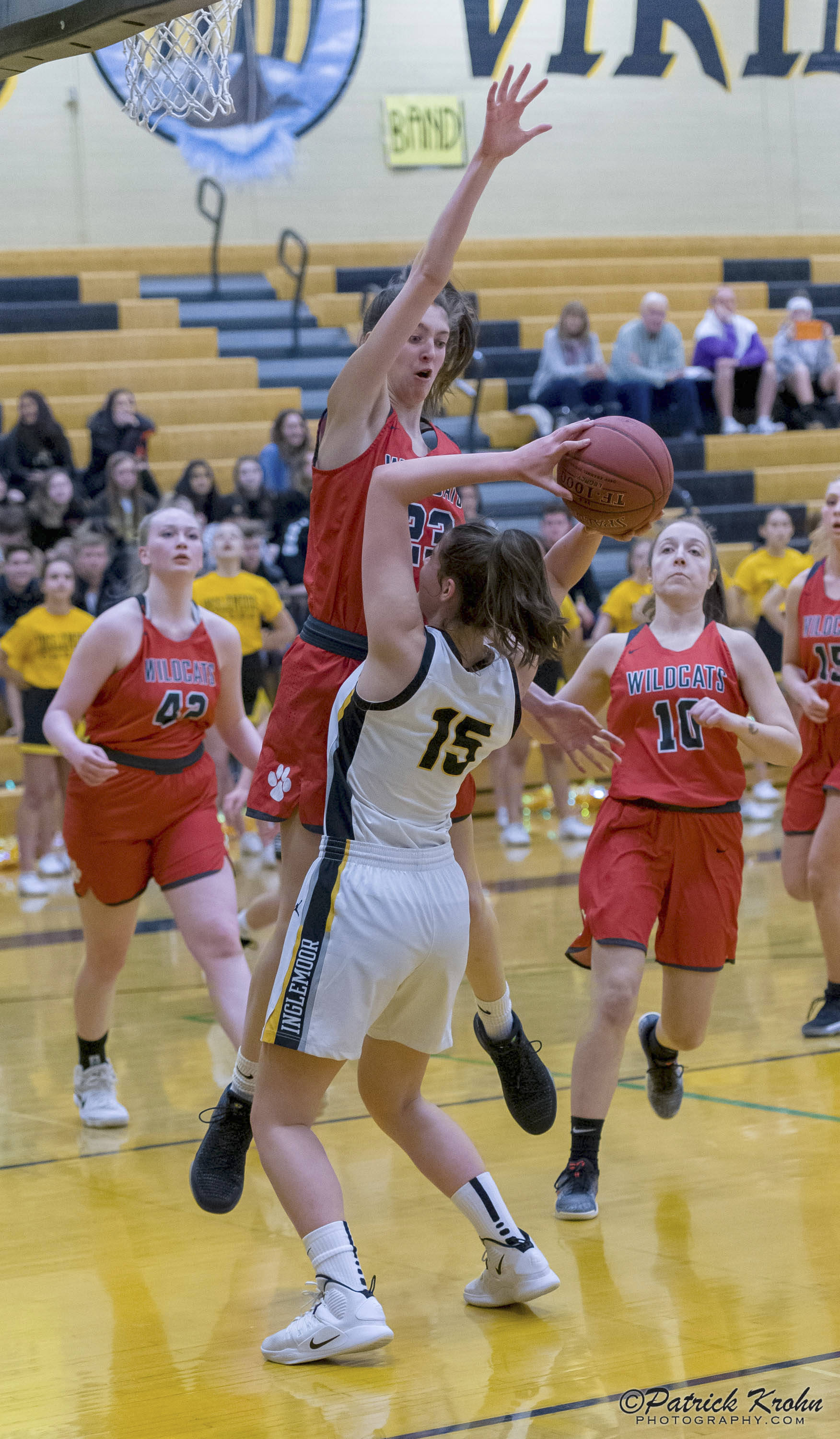 Inglemoor junior Cecelia Bresee, right, is defended proficiently by Mount Si freshman forward Lauren Glazier, left, during a Wes-King 4A district playoff game on Feb. 7 at Inglemoor High School in Kenmore. Photo courtesy of Patrick Krohn/Patrick Krohn Photography