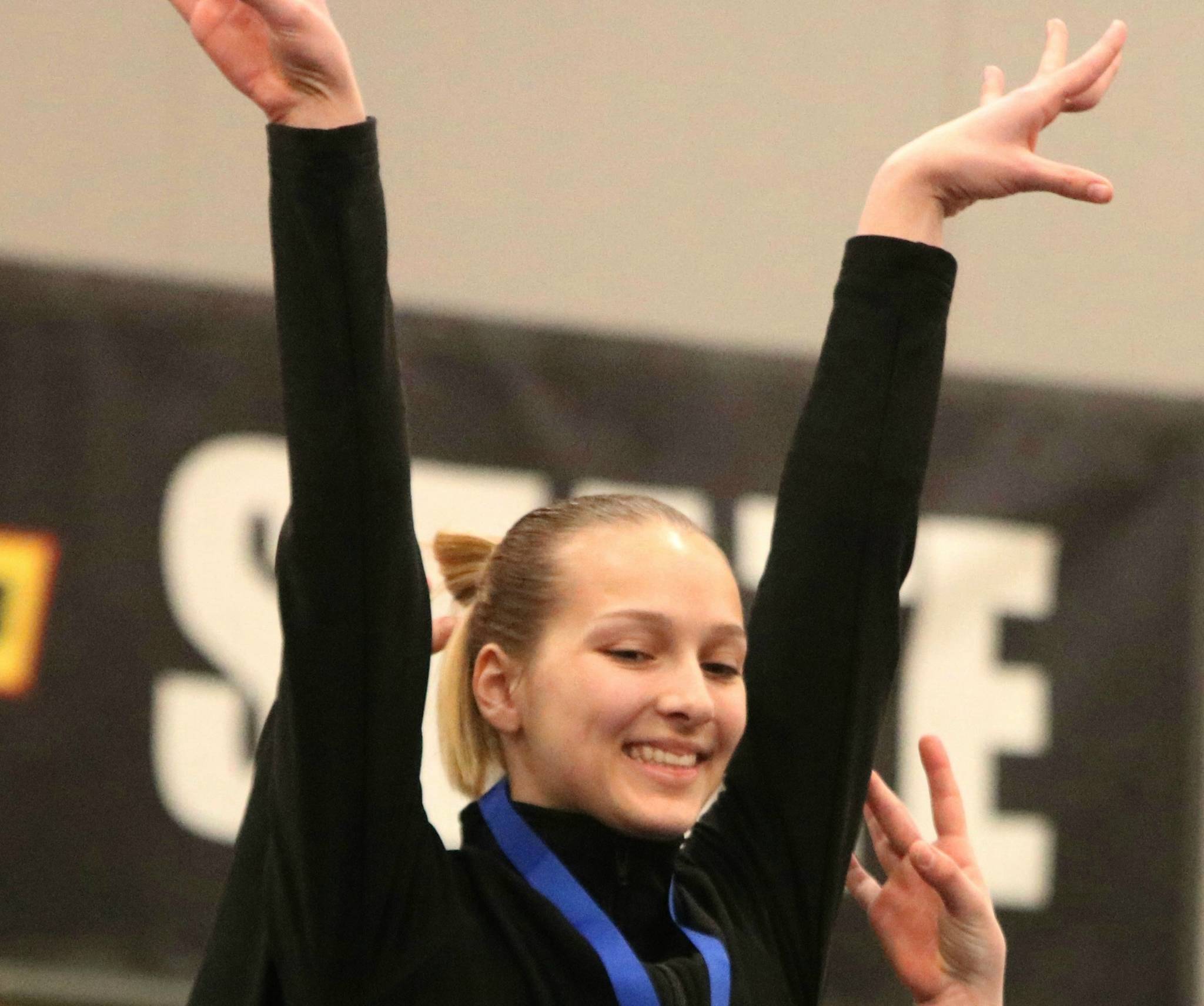 Bothell’s Taylor swings to first on bars at state