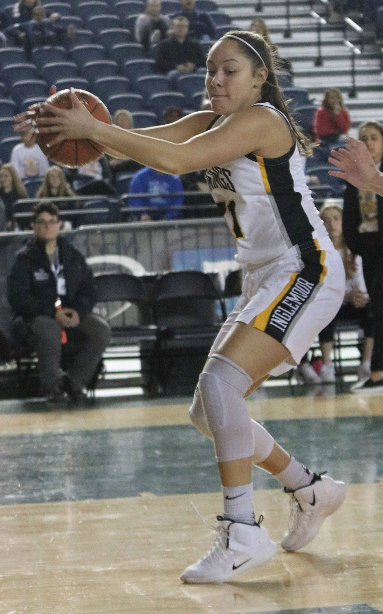 Inglemoor’s Isabella Reed grabs a rebound. Andy Nystrom/ staff photo