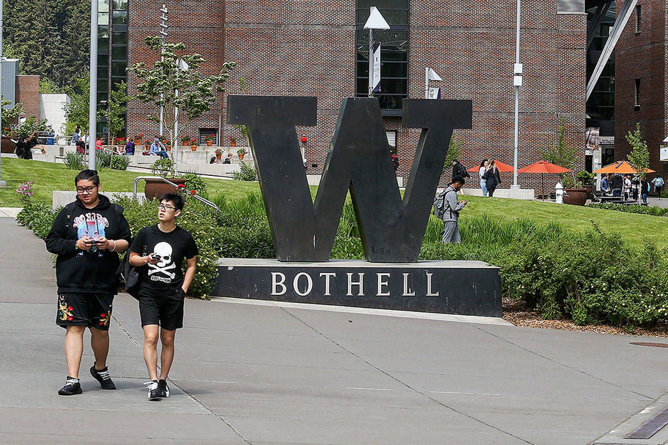 Students walk to classes at the UW Bothell campus on May 5, 2018 in Bothell. Andy Bronson/staff photo