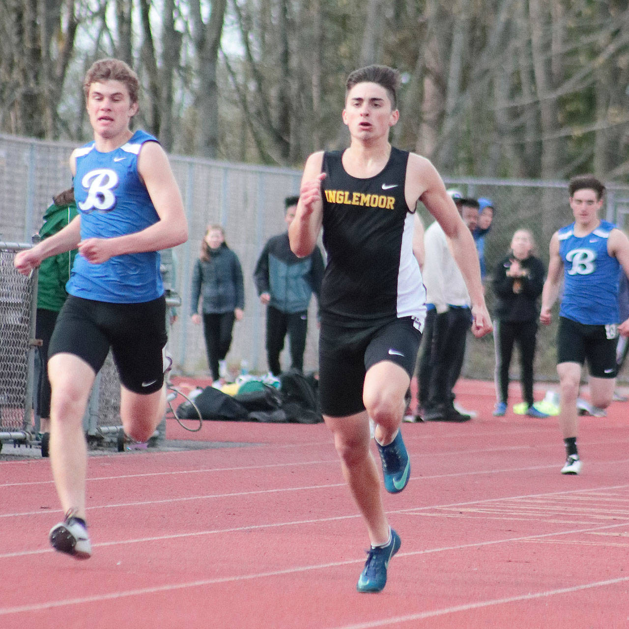 On the Viking boys’ side, Kincaid Schmitt (middle) stands first in the long jump with a 20-7.5, second in the 200 in 22.83 and second in the 400 in 50.60. Photo courtesy of Sean Valley