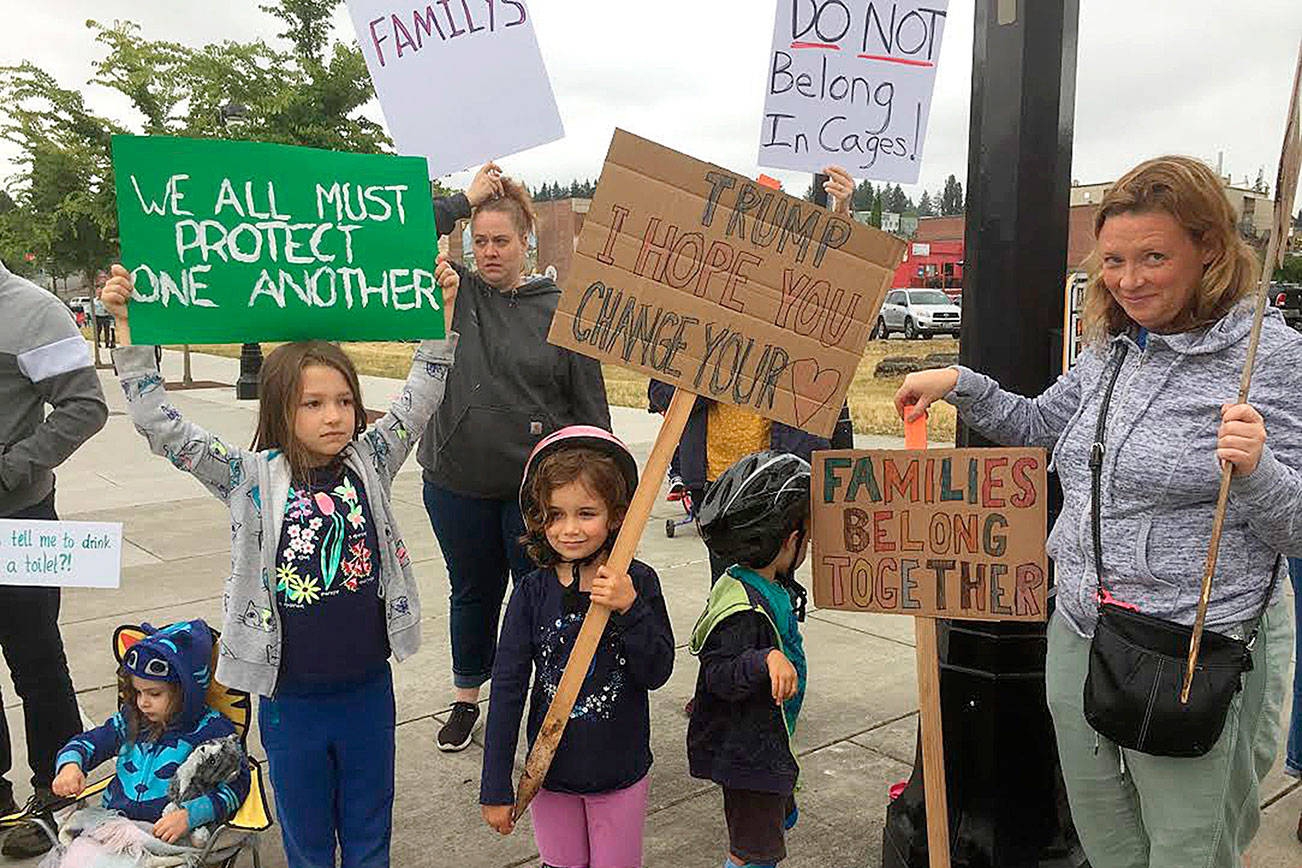 Photo courtesy of Claire Robson                                 More than 100 people gathered for the #ClosetheCamps protest in Bothell on July 2.