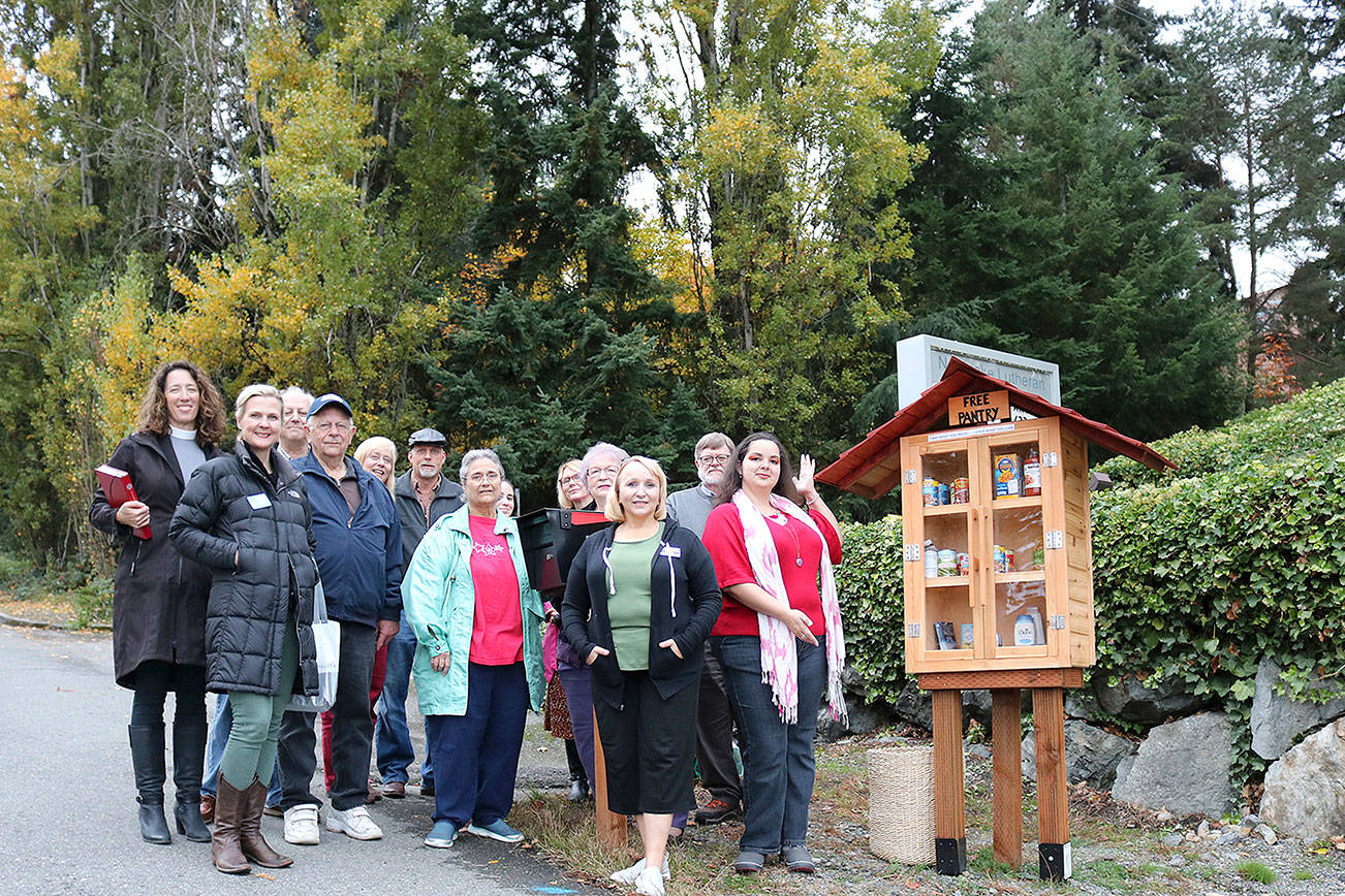 Northlake Lutheran Church members gathered on Oct. 22 for the unveiling of the new Little Free Pantry at 6620 NE 185th St. in Kenmore. Stephanie Quiroz/staff photo