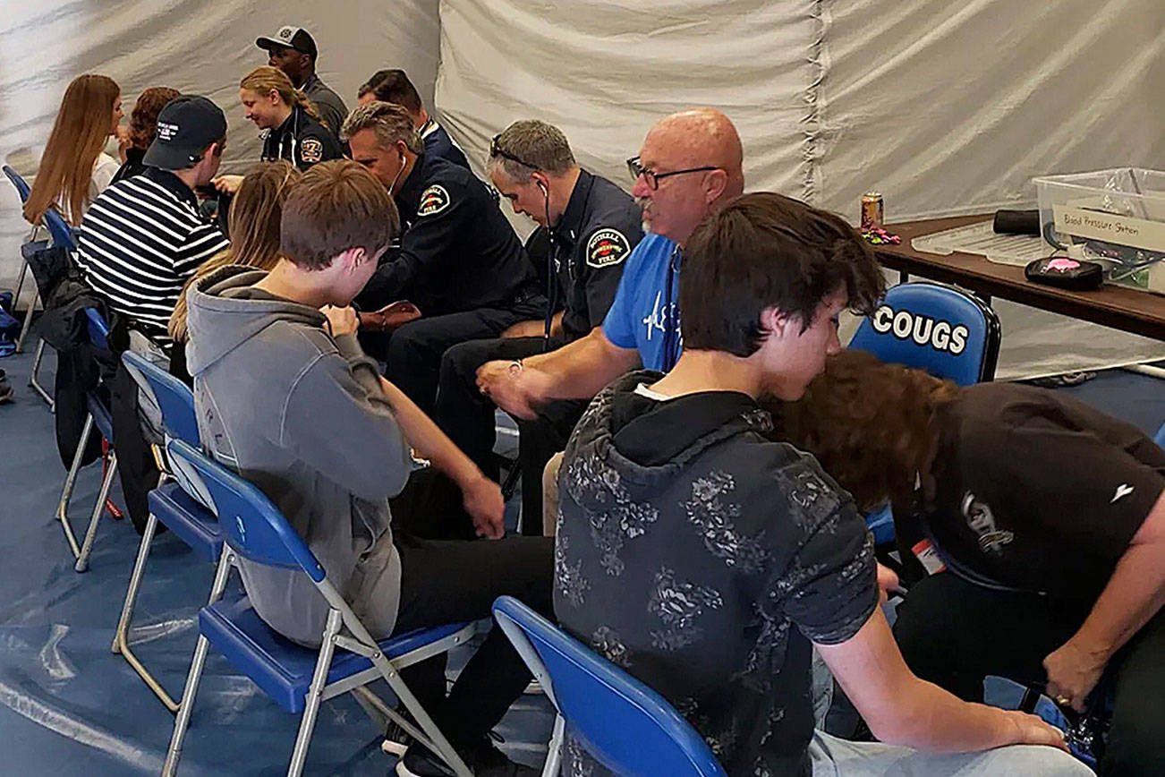 Courtesy photo                                 UW Medical and the Nick of Time Foundation administered 567 free heart screenings at Bothell High School on Nov. 6.