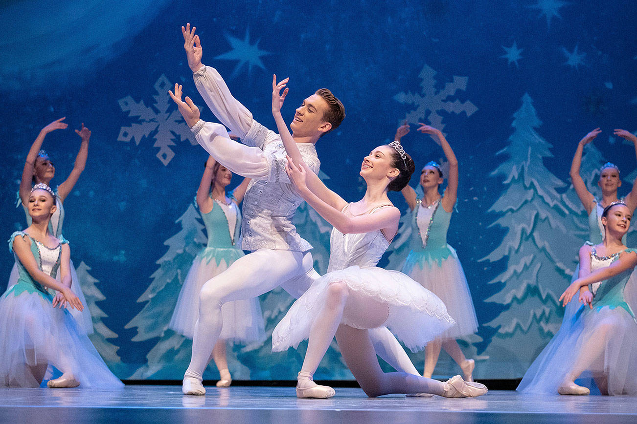 Photo courtesy of Wade Heninger                                Dancers Rafe Dahlinger and Nina Nemtchinov as characters Cavalier and Big Clara, respectively.