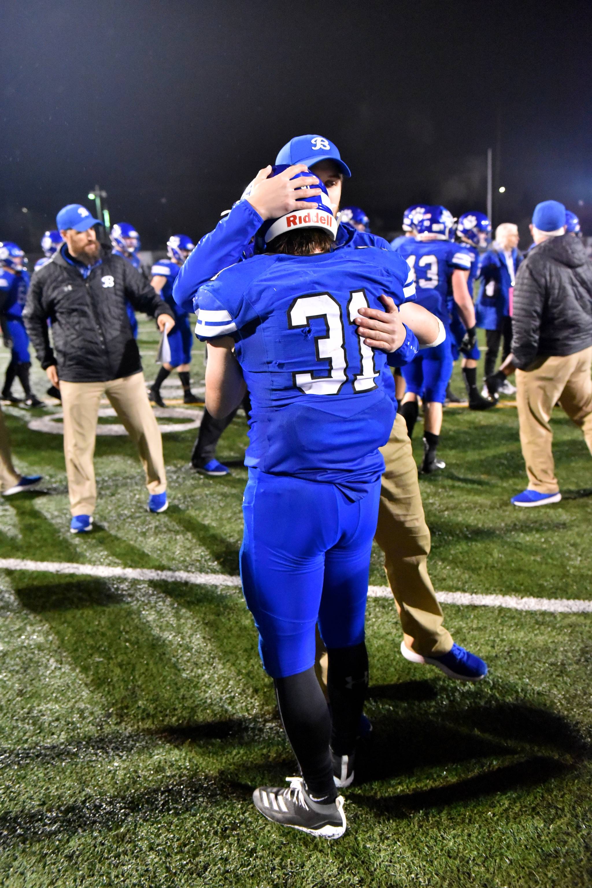 Ryan Metz receives a hug following the state championship game. Photo courtesy of Greg Nelson