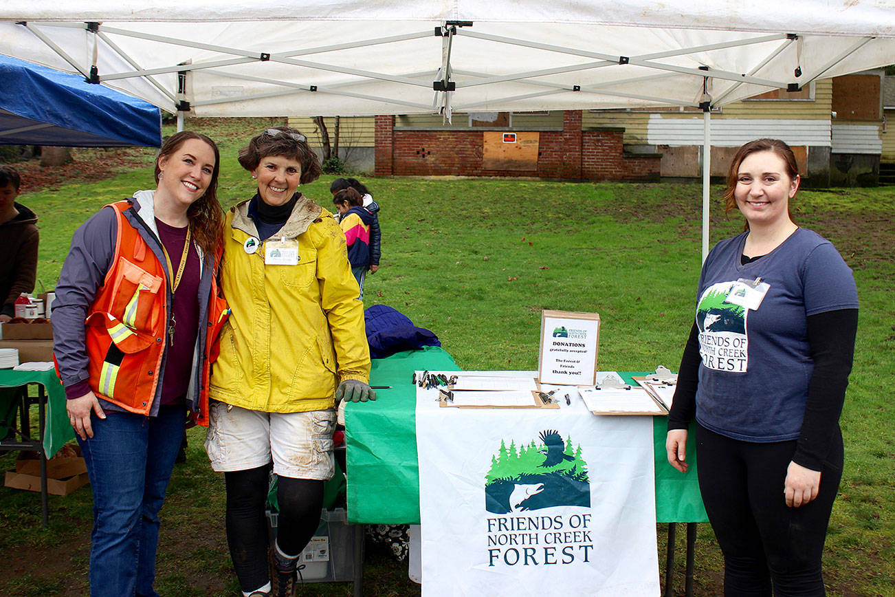 From left to right: the city of Bothell’s Christi Cox and Friend of North Creek Forest’s Paula Quigg and Melissa Gugala. Blake Peterson/staff photo