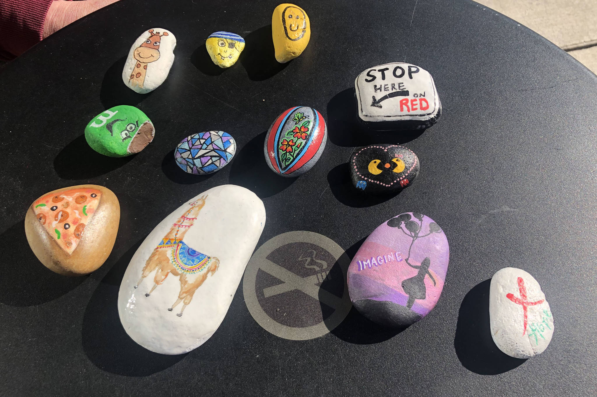 Mitchell Atencio/staff photo                                 A display of some of Cynthia Bemis’ painted rock collection, in Lynnwood, on Feb. 20.