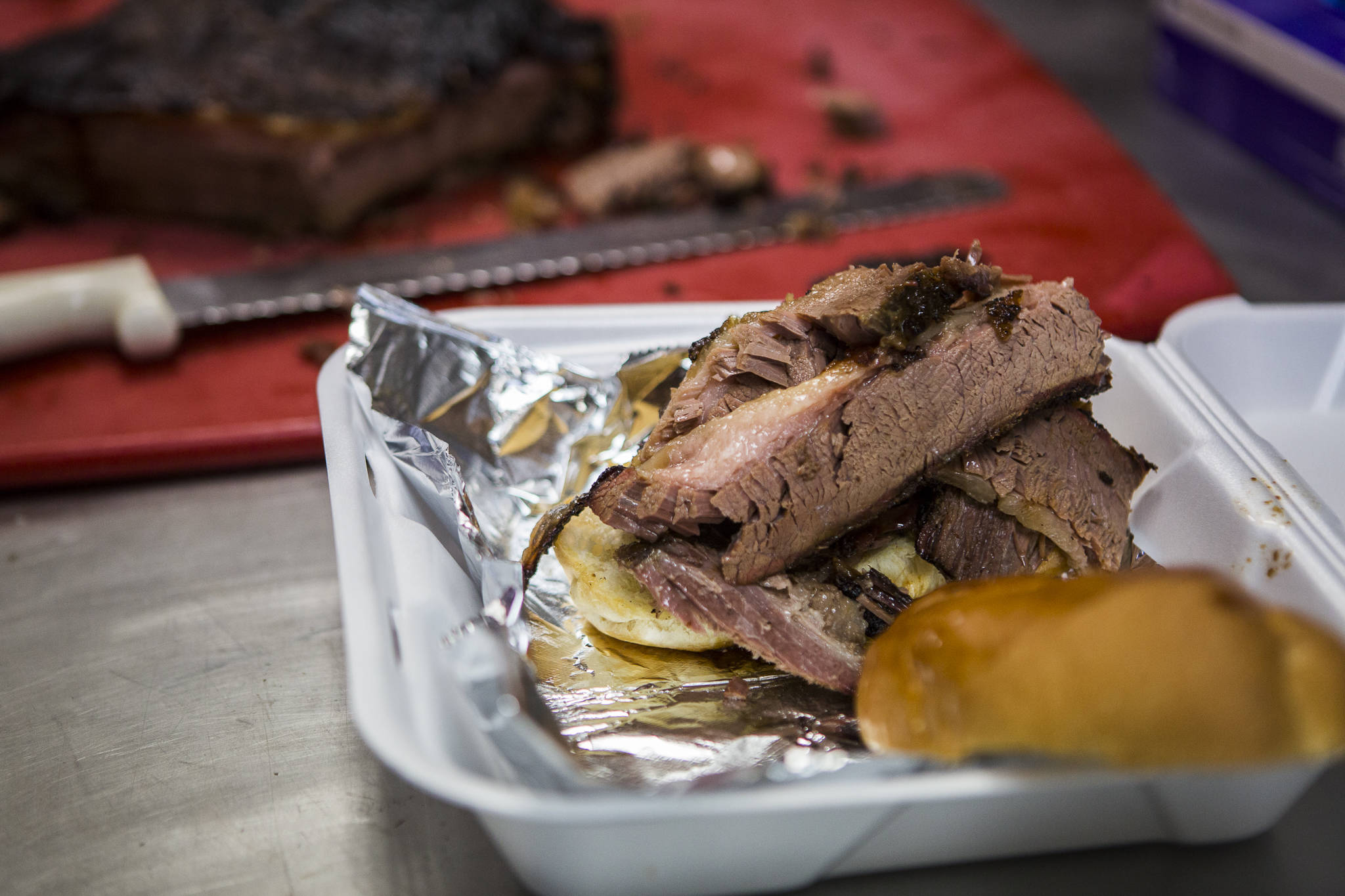 A brisket sandwich is ready for pick-up at Carolina Smoke in Bothell. Olivia Vanni/staff photo