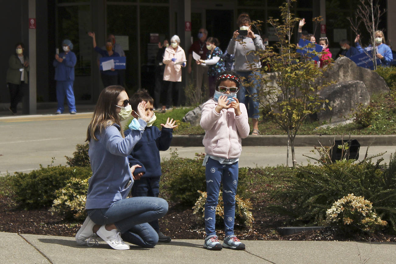 American Medical Response (AMR) organized a parade of first responders to show appreciation for St. Elizabeth Hospital staff April 30. Photo by Ray Miller-Still/Sound Publishing