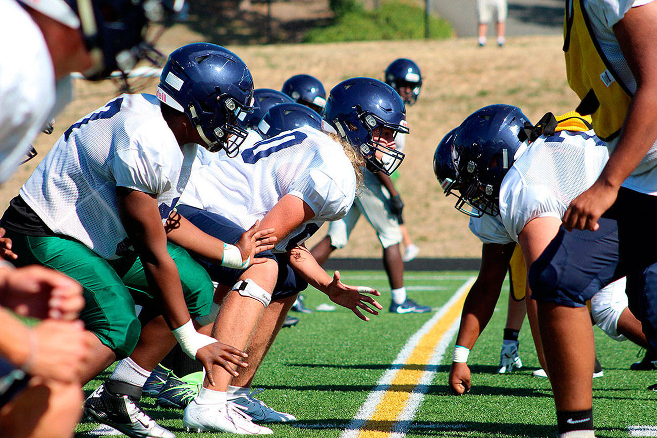 The Todd Beamer Titans football team in Federal Way during a 2019 summer practice. File photo